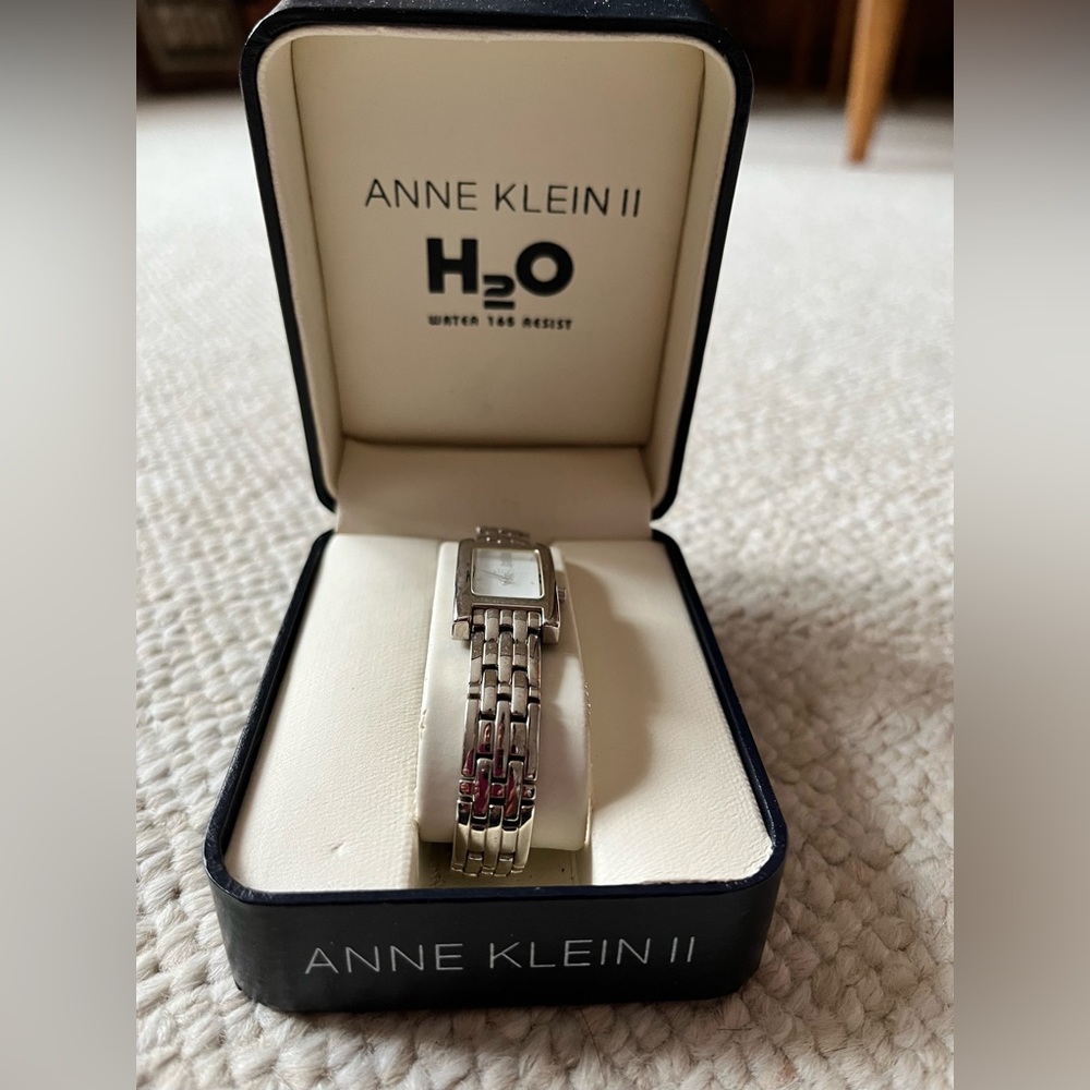 Gently used silver Anne Klein watch. Very good condition.